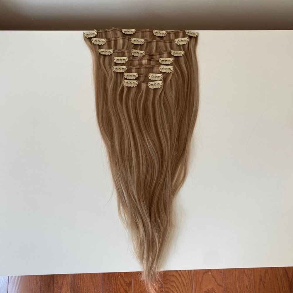 Clip in human hair extensions
